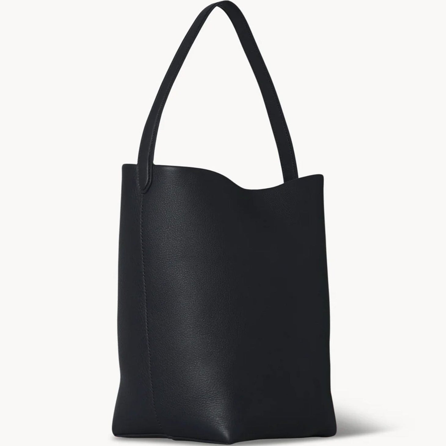 Black slouchy leather tote bag with minimalist silhouette