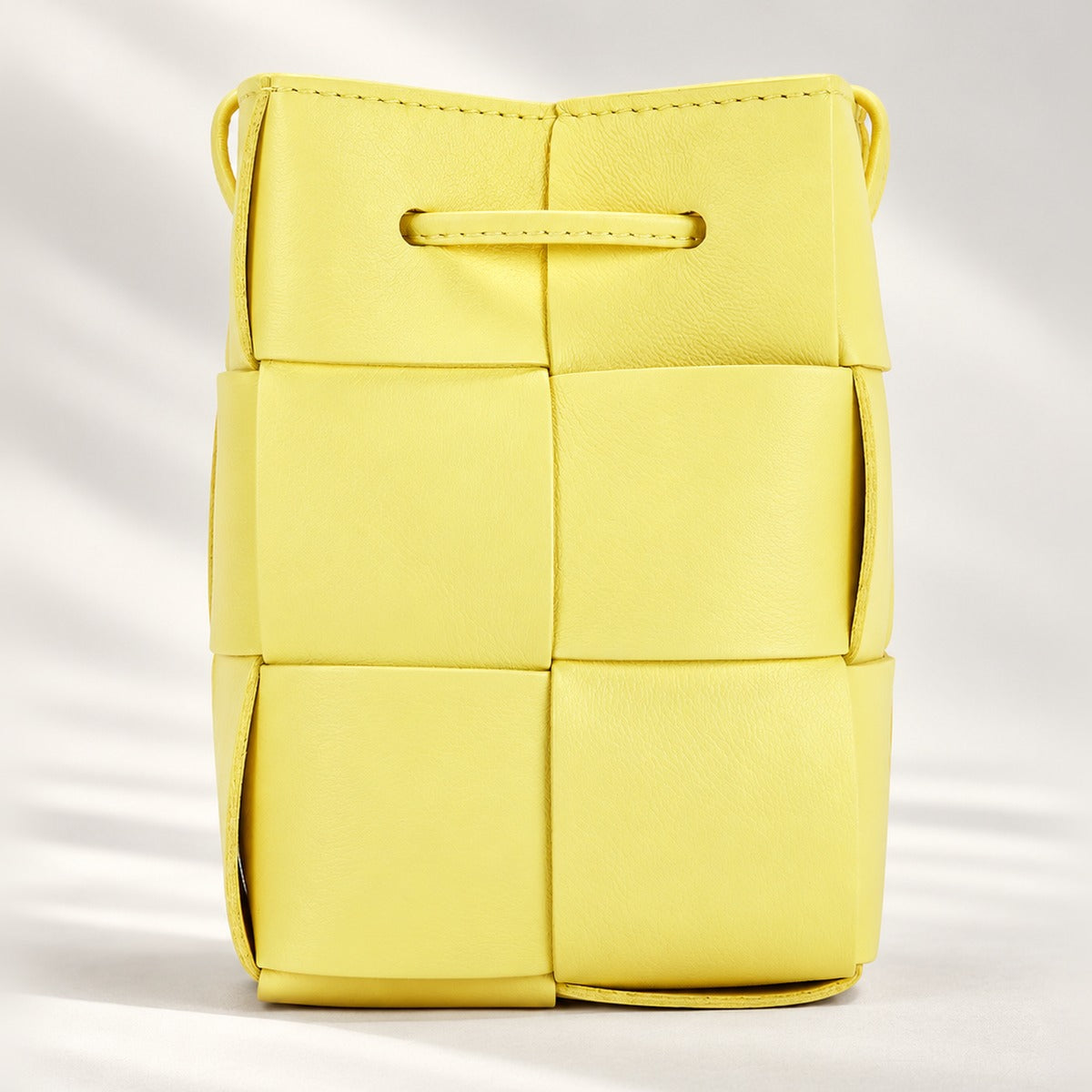 Chic Woven Mini Crossbody Bucket Bag in Light Yellow, lightweight woven PU leather shoulder bag with 21 in strap drop