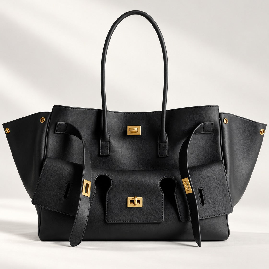 Medium Structured Leather Tote in Black with gold hardware, top handle and full top zip, 12.6 x 9.5 x 5.5 in