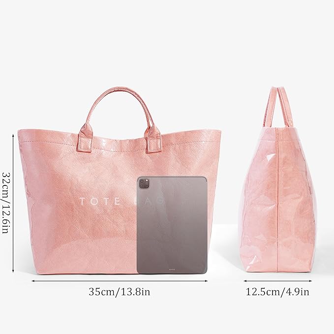 Trendy baby pink PVC Dupont tote bag with glossy finish – viral fashion carry-all perfect for everyday style, shopping, and on-the-go looks