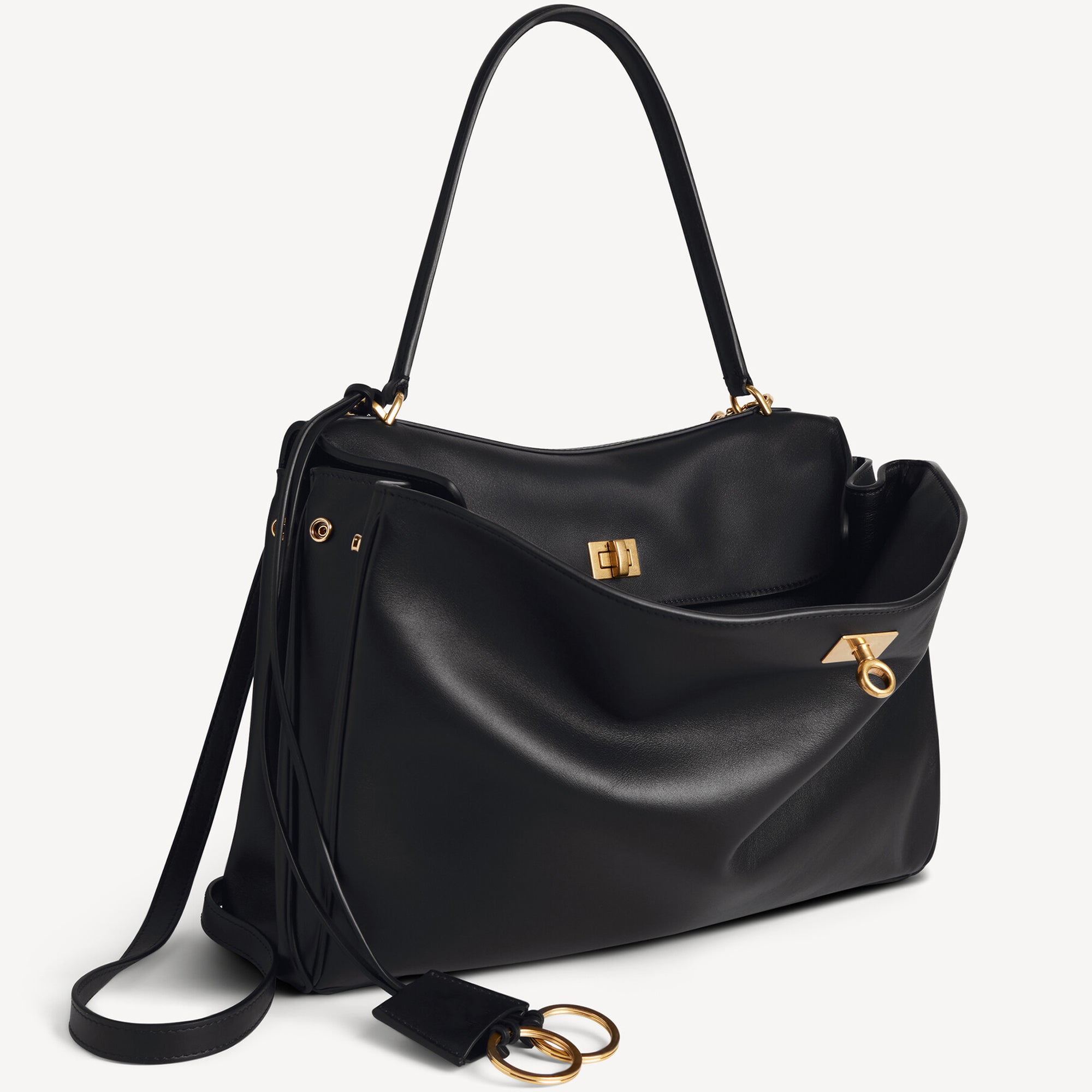 Black Rodeo inspired leather tote with gold hardware featuring a relaxed rectangular silhouette.