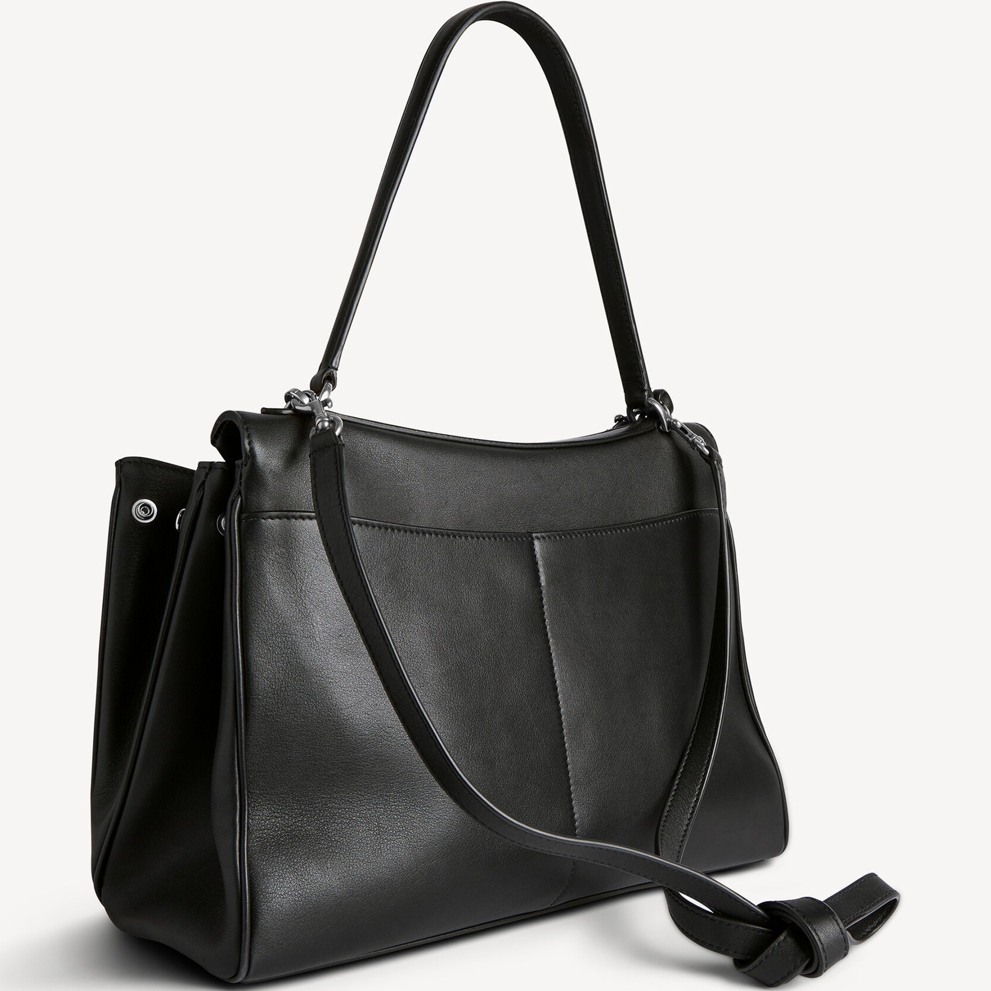 back view of chic black slouchy medium tote bag with polished silver hardware and a relaxed rectangular shape.