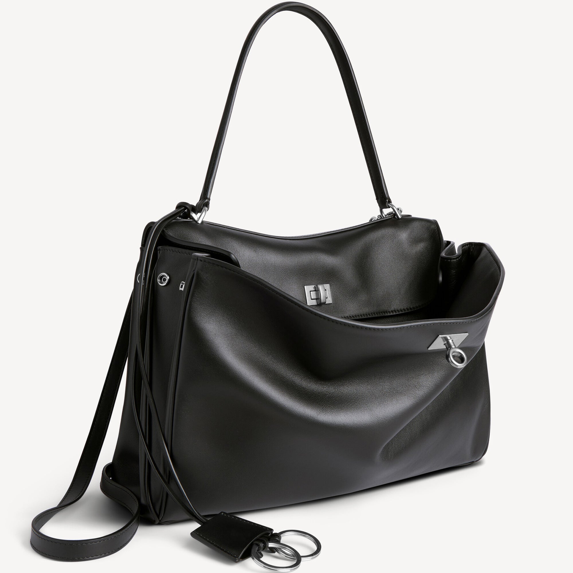 chic black slouchy medium tote bag with polished silver hardware and a relaxed rectangular shape.