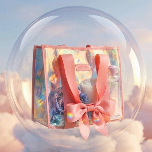 BowMe Prism Pink beach tote with an oversized bow inside an iridescent soap-bubble background