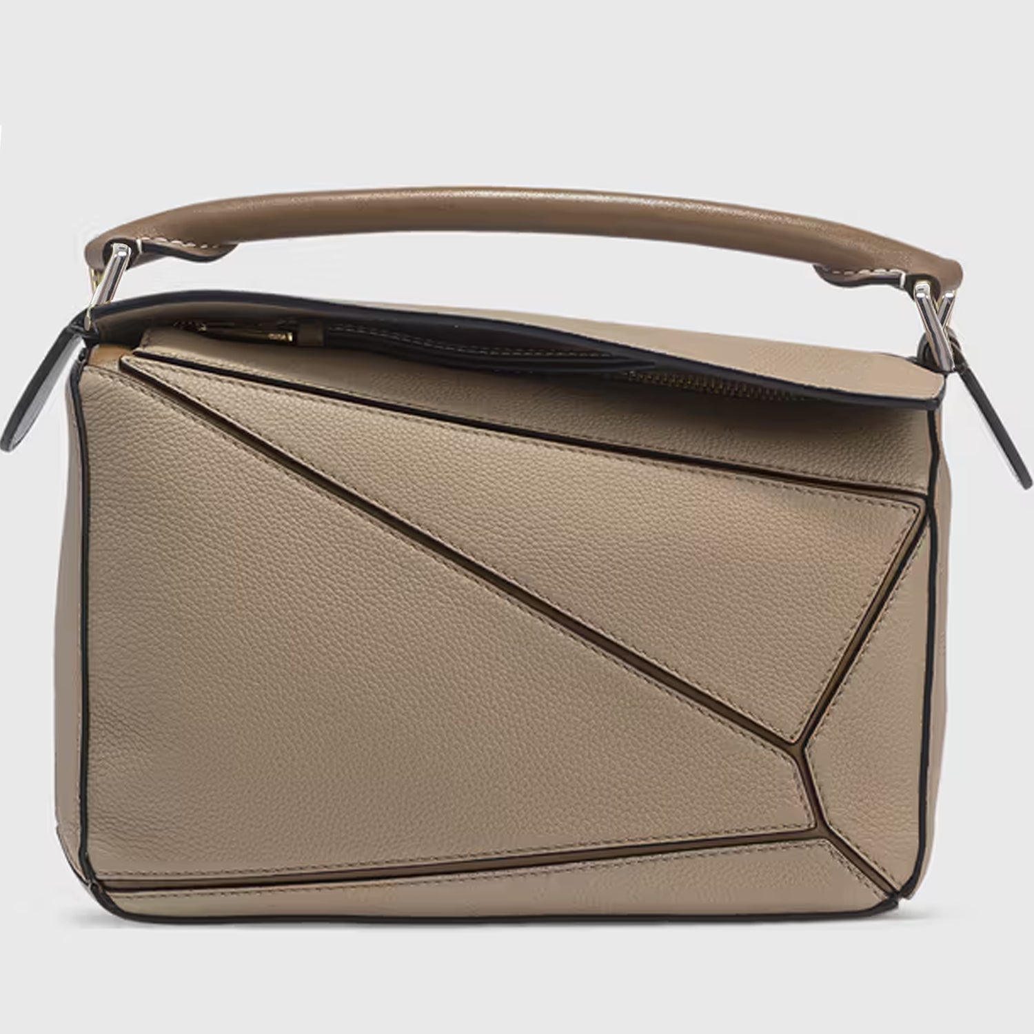 Compact Sculptural Beige Leather Bag with Silver Accents details