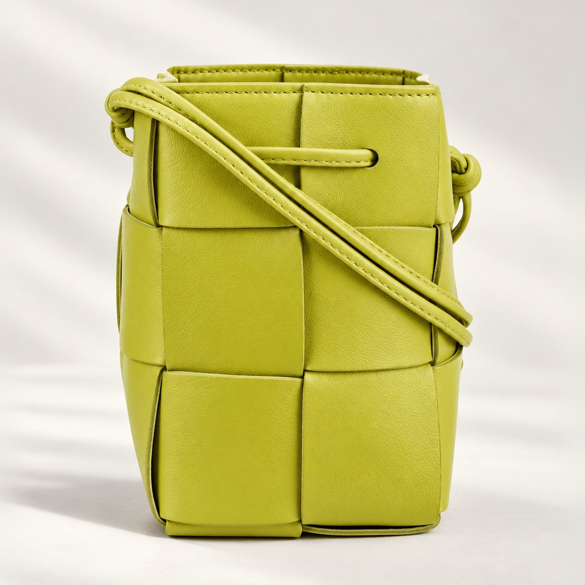 Chic Woven Mini Crossbody Bucket Bag in Kiwi Gold, lightweight woven PU leather shoulder bag with 21 in strap drop