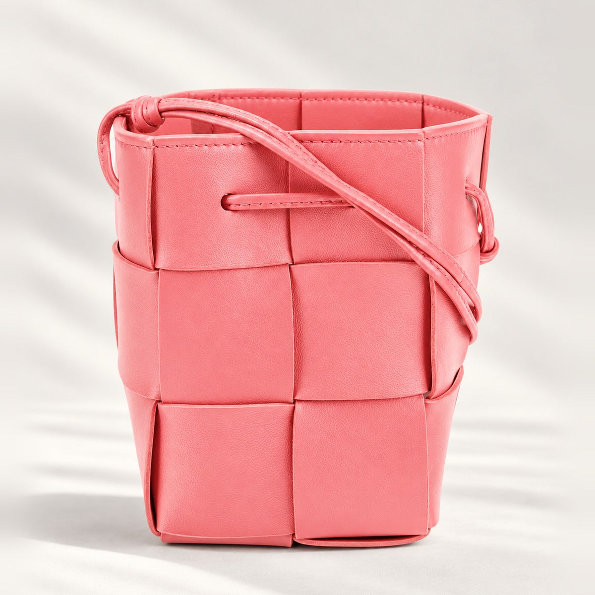 Chic Woven Mini Crossbody Bucket Bag in Pink, lightweight woven PU leather shoulder bag with 21 in strap drop
