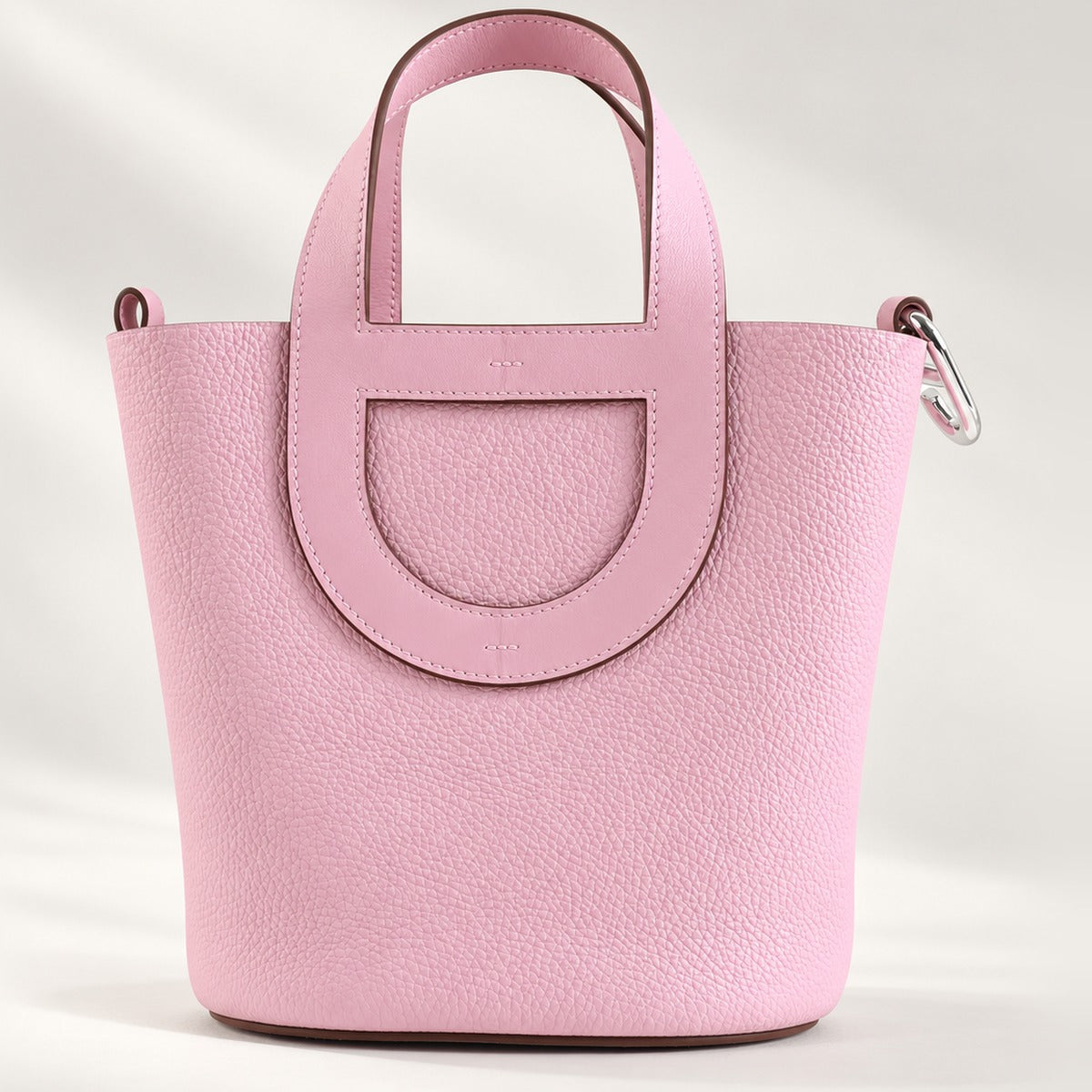 Loop Handle Leather Tote in Pink, sculpted leather tote with silver-tone hardware and drawstring pouch, 9.1 x 9.8 in