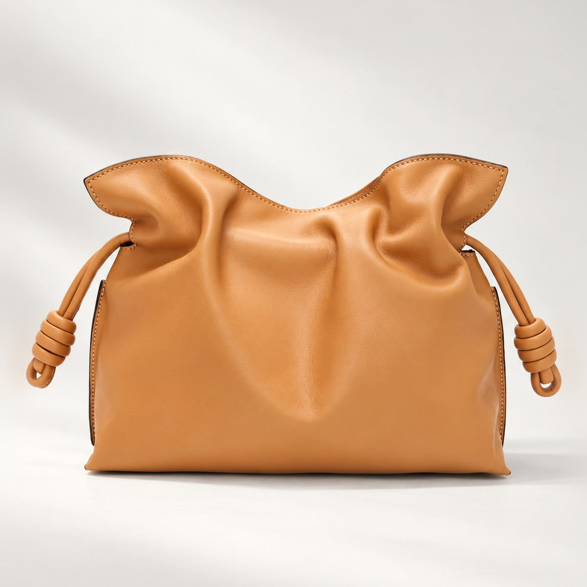 Medium Slouchy Leather Clutch in Warm Desert, nappa calf leather with knot drawstring and detachable strap, 11.8 x 9.6 in