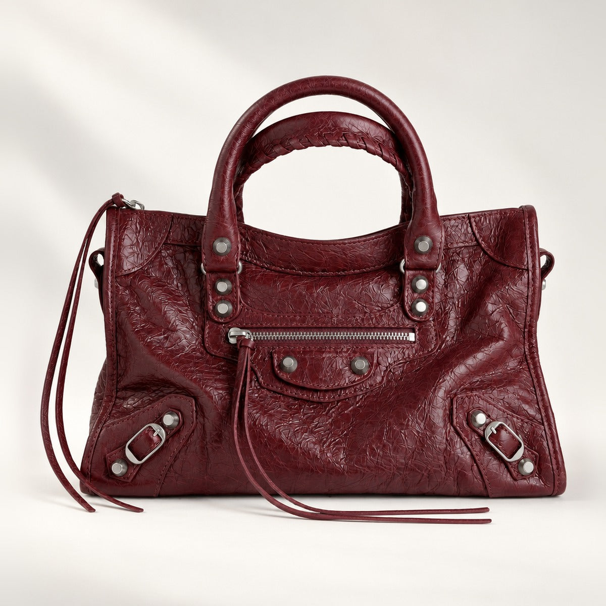 Small City-Style Leather Shoulder Bag in Burgundy, moto detail, dual top handles, top zip and detachable strap, 12 x 8 in