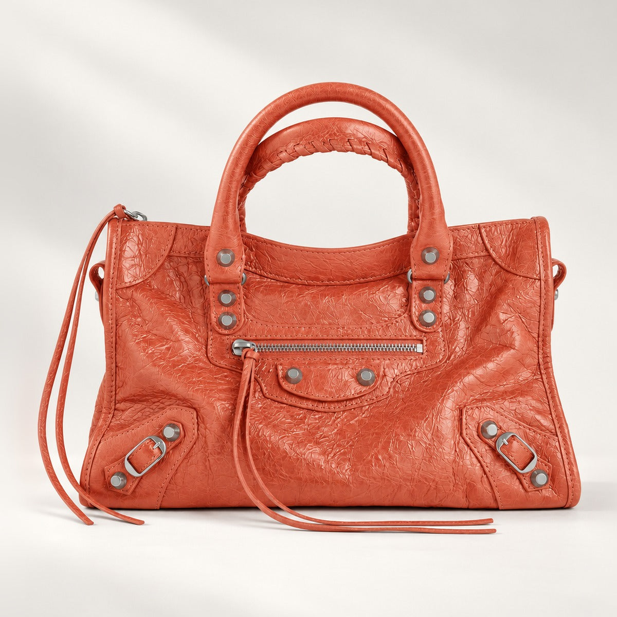 Small City-Style Leather Shoulder Bag in Orange, moto detail, dual top handles, top zip and detachable strap, 12 x 8 in