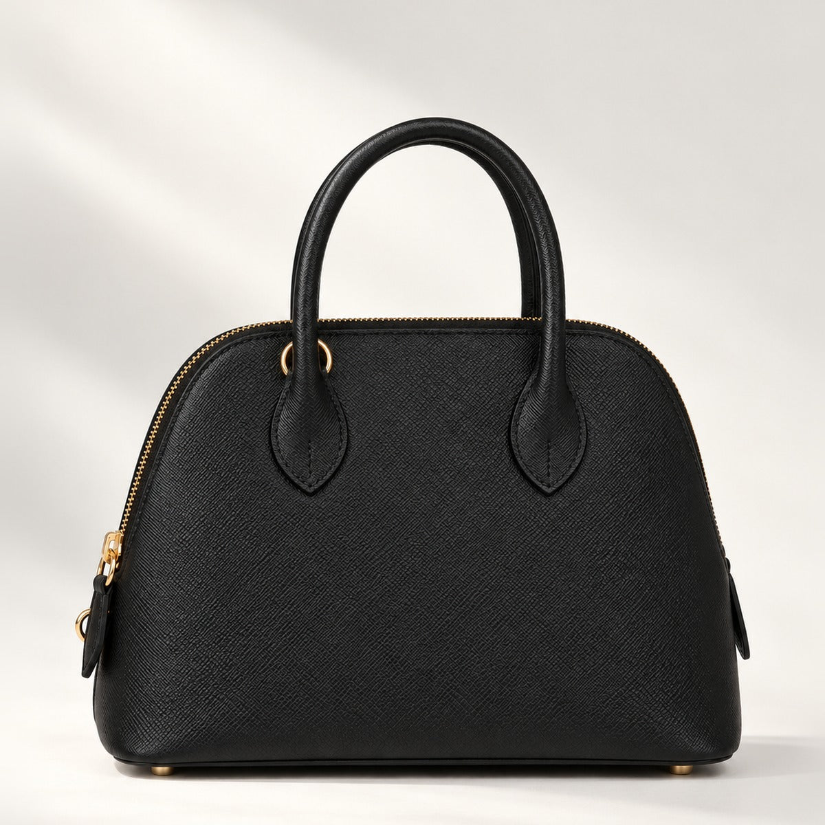 Structured Dome 25 Satchel in Black, vegan leather top handle crossbody bag with gold-tone hardware, 10.2 x 7.9 in